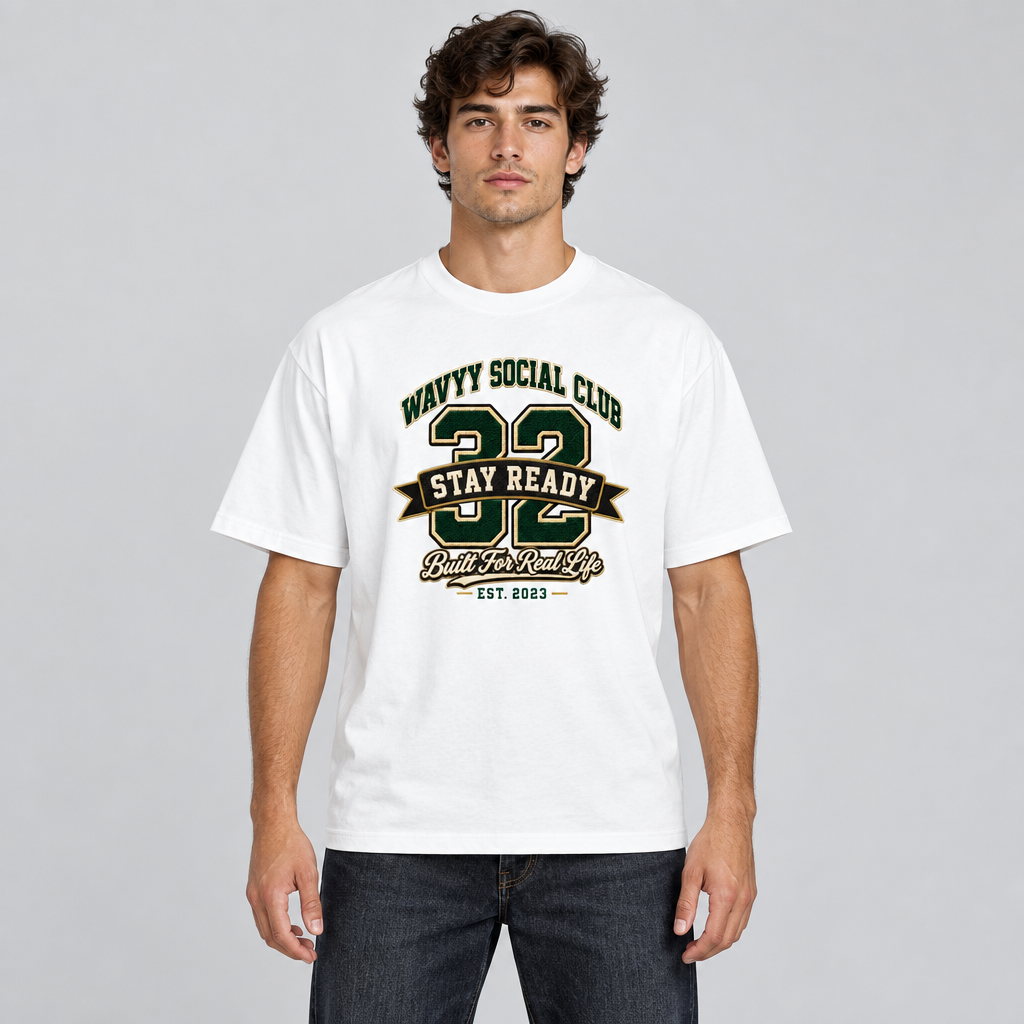 Model wearing the white Wavyy Social Club 32 varsity graphic cotton T-shirt