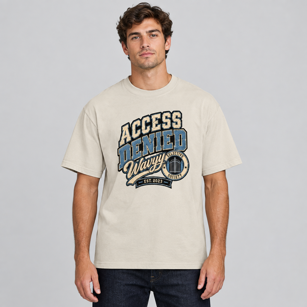 Model wearing the beige Access Denied varsity graphic cotton T-shirt